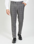 Pantaloni con pince fantasia check