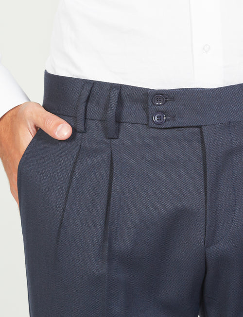 Pantaloni con pence occhio di pernice in lana