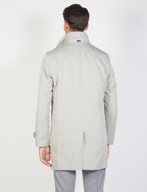 Coat with bib in technical fabric 