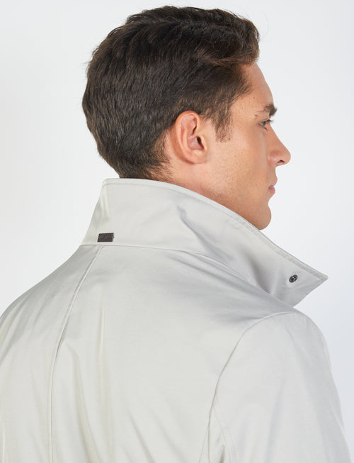 Coat with bib in technical fabric 