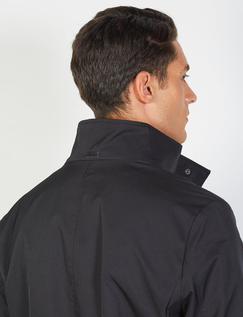 Coat with bib in technical fabric 