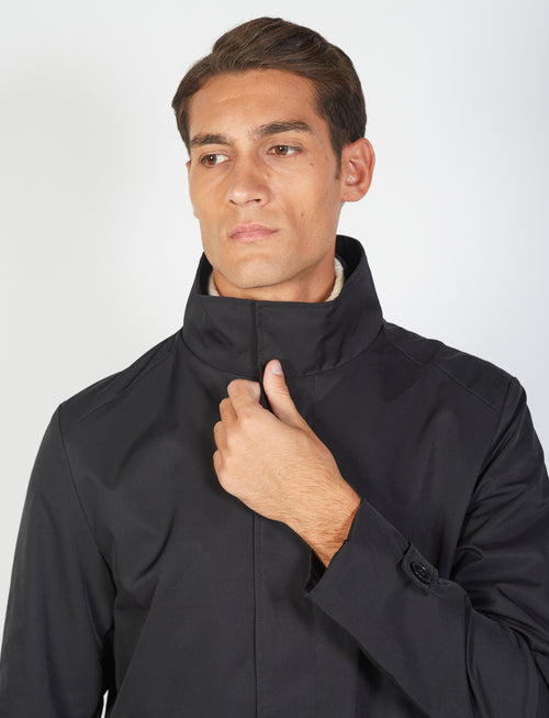 Coat with bib in technical fabric 